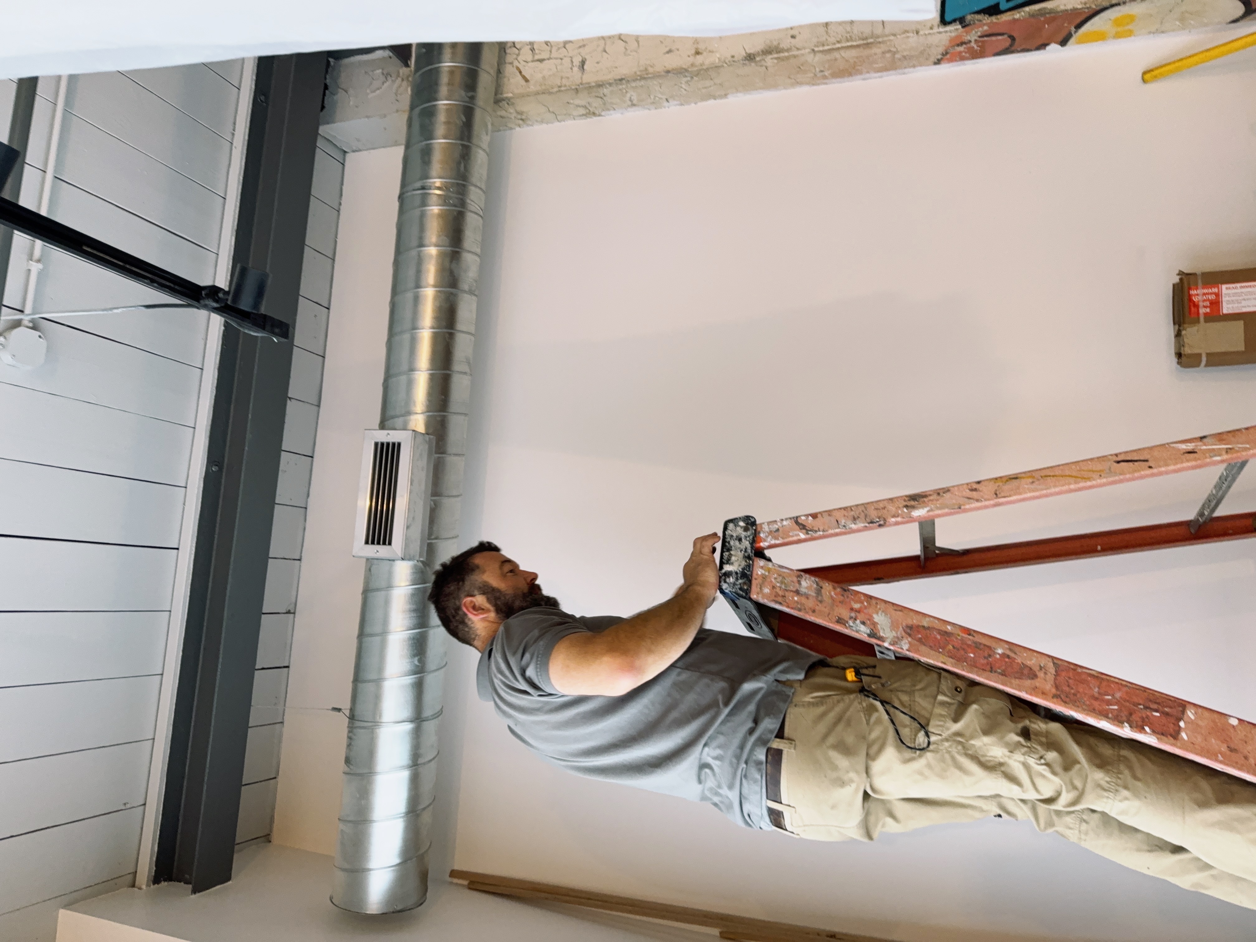 John Calhoun Electric technician servicing residential HVAC equipment